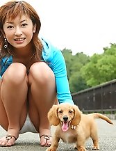 Long Legged asian babe Nao Komuro walking with her little dog